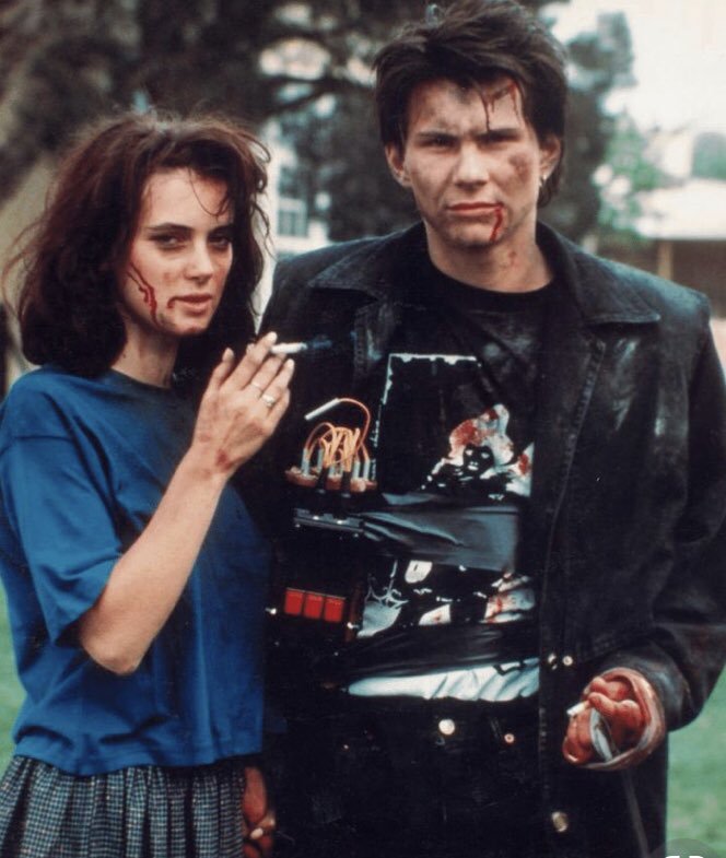 Veronica and JD covered in blood and smoking - original heathers what's wrong with the Heathers reboot?