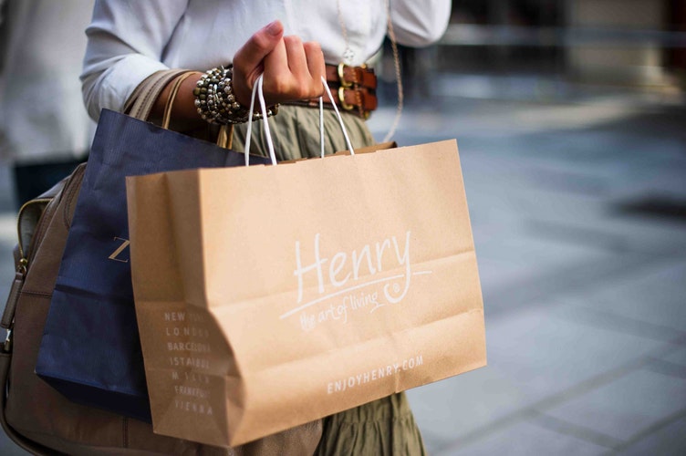 a woman shopping holding bags